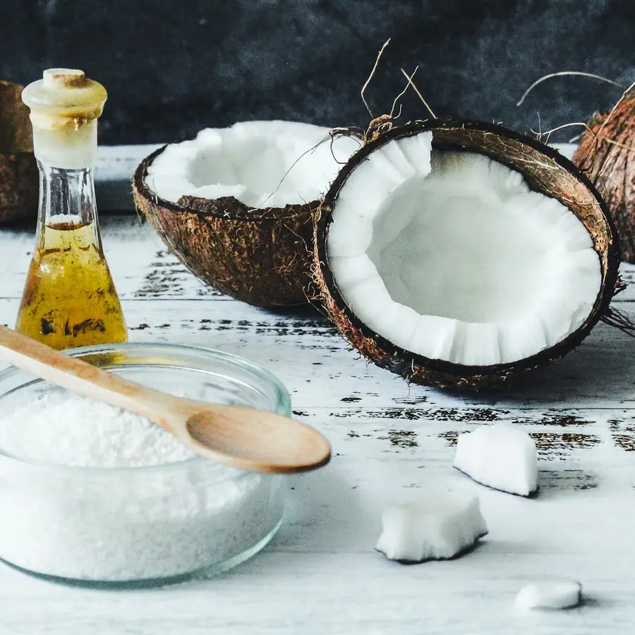 Coconuts and a bottle of oil